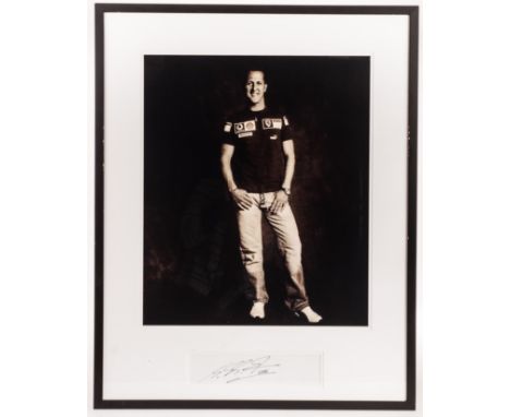 An original photographic portrait of Michael Schumacher, signed beneath by the subject, from the Kraken Opus publicity shoot 