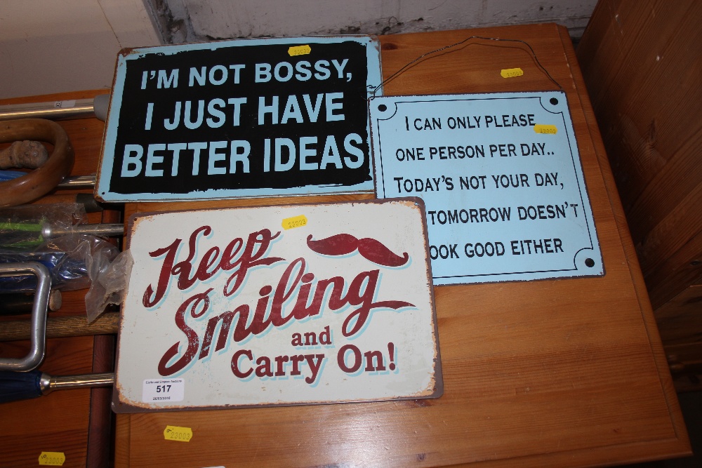 Three novelty signs