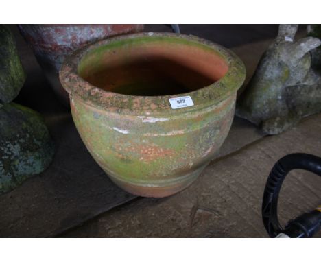 A large terracotta planter