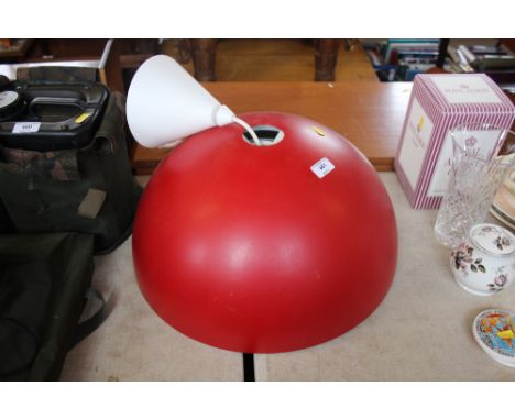 A large red light fitting