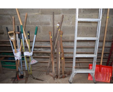 Two sledge hammers, a pick axe etc. 