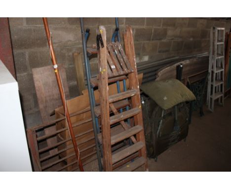 A wooden and metal step ladder; together with a wooden step ladder
