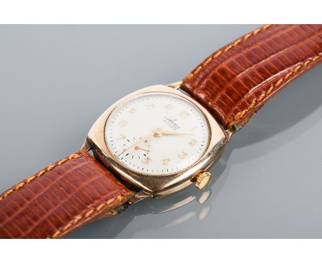 GENTLEMAN'S NINE CARAT GOLD CUSHION CASED AVIA WRISTWATCH
the round dial with Arabic numerals and subsidiary seconds at six, 