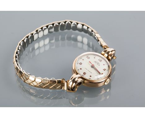 LADY'S EARLY TWENTIETH CENTURY NINE CARAT GOLD TREBEX COCKTAIL WATCH
the silvered dial with Arabic numerals, in nine carat ye