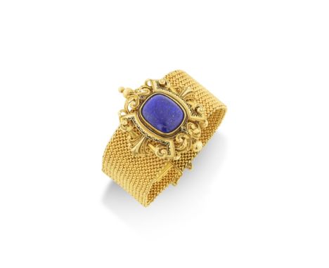 BRACELET LAPIS-LAZULI ET EMAIL, CIRCA 1880Composé d'un bandeau souple en or jaune, orné d'un élément amovible centré d'un cab