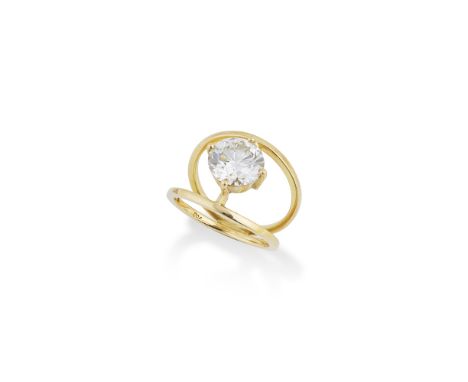 BAGUE DIAMANTFormant deux anneaux en or jaune centrés d'un diamant de taille brillant pesant 4.33 carats, poinçon français d'