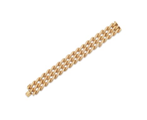 BUCCELLATI: BRACELET OR, CIRCA 1950Composé de maillons articulés et texturés en or jaune, signé M.Buccellati, poinçon françai