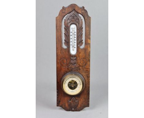 Wandbaro-/ Thermometer 1920er Jahre beschnitzte Eichenholzplatte mit Barometer sowie Quecksilber Thermometer ausgeführt, ca. 