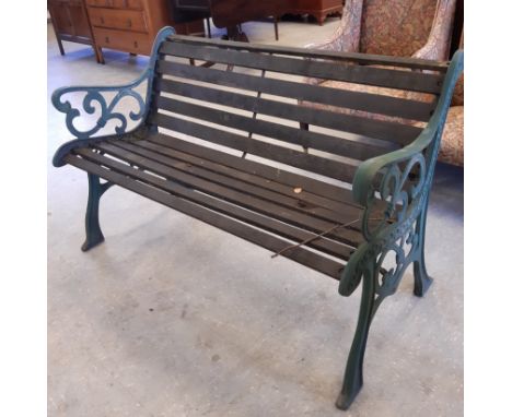 Green cast metal garden bench with wood slats (slats need replacing)