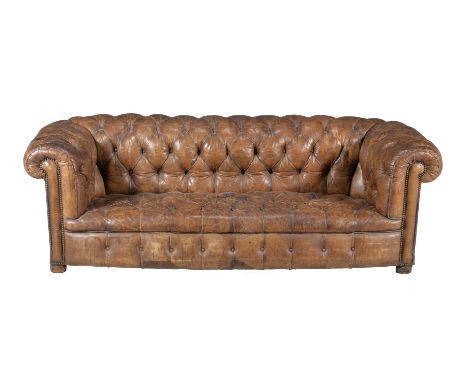 A leather upholstered sofa, of Chesterfield type, 73cm high, 220cm wide, 85cm deep