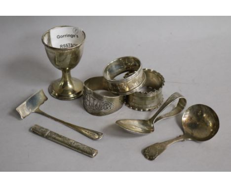 Mixed silver including napkin rings, caddy spoon etc.