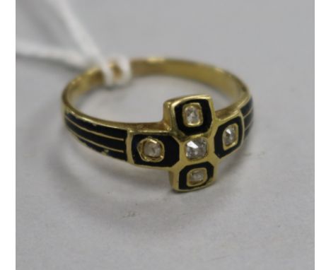 A Victorian yellow metal, black enamel and diamond set mourning ring, size P.