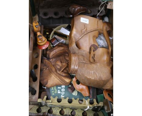 A collection of smoker's accessories and decorative items, including novelty and other lighters, pipe racks, pipes, two carve