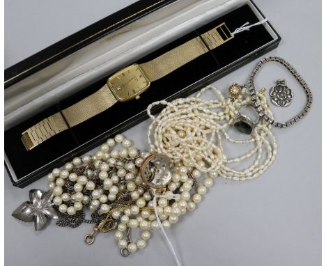 A Rotary gilt metal quartz wristwatch with date aperture, a Titus bull's-eye fob watch, sundry costume jewellery, etc.