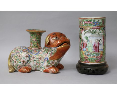 A Japanese Kutani porcelain lion dog candlestick, enamelled and gilt decoration and a Canton vase candlestick height 10cm