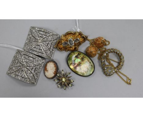 A small collection of costume jewellery, including a star brooch, a Royal Collection gilt metal and enamel 'Faberge egg' pend