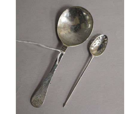A late 17th century silver spoon and a Georgian mote spoon, the first with 'AS' mark, engraved initials to bowl verso and flo