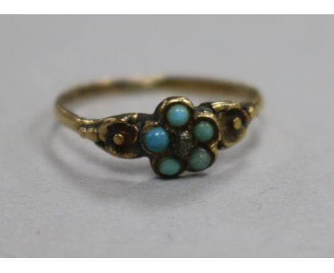 A small Victorian yellow metal and turquoise ring, size K.
