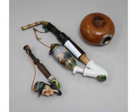 Two Austrian porcelain-mounted ceramic pipes and a Bombilla pot (3)