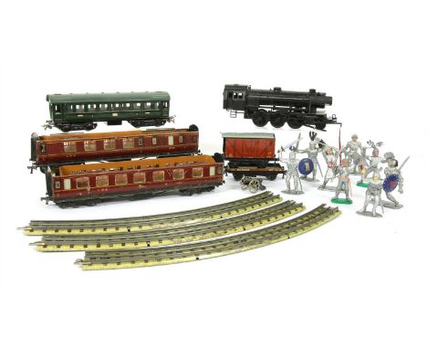 A Marklin tin plate German train set, together with plastic knights and soldiers, and a box of tin plate Hornby 00 train set