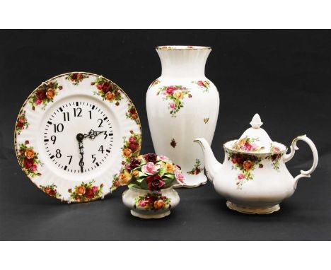 A collection of Royal Albert Old Country Roses , to include vase, wall clock, fruit bowl, place mats, etc