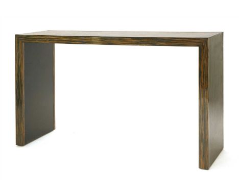 A contemporary Macassar ebony console table, with a leather top, 140cm wide, 45cm deep, 85cm high