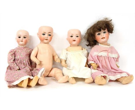 An Armand Marseille 990 bisque headed doll, together with an Armand Marseille 390, a Heubach Koppelsdorf 300, and a Heubach K
