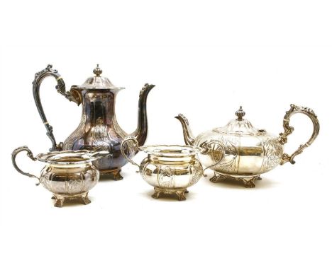 A four piece silver tea and coffee set , Birmingham 1969, maker's mark FH, of panelled form decorated with floral and foliate