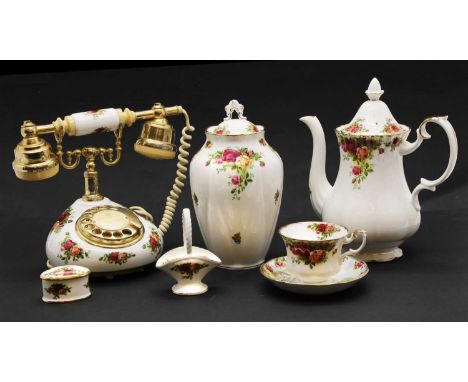 A collection of Royal Albert Old Country Roses , to include serving plates, lamp, telephone, clock, trinkets, cups, etc