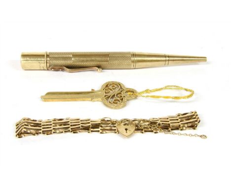 A 9ct gold door key, London 1966, together with a 9ct gold five row gate bracelet, with alternating twisted and plain bars, t