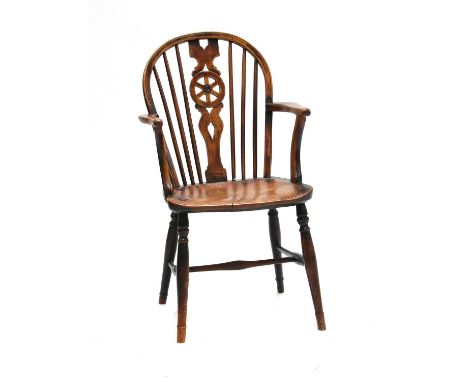 A 19th century elm and ash Windsor stick and hoop back armchair