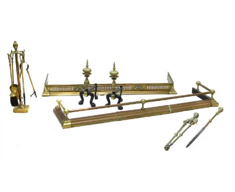 A collection of fireside items, comprising Pair of Regency brass fire dogs, two fire implements, two fenders, a brass coal sc