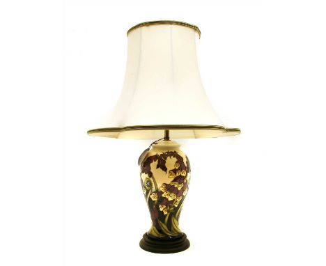 A Moorcroft pottery table lamp , in the Foxglove pattern, having original shade, lamp base, 38cm high, with shade, 60cm high,