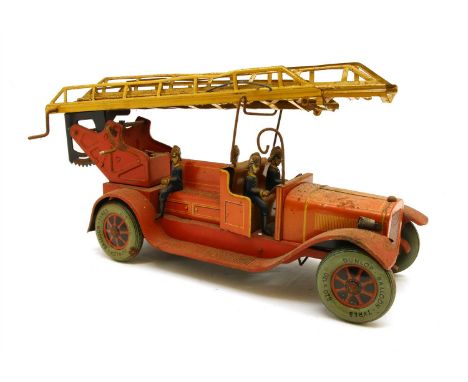 An early 20th century German tin plate fire engine, possibly Distler, with seated fire fighters and extendable ladder