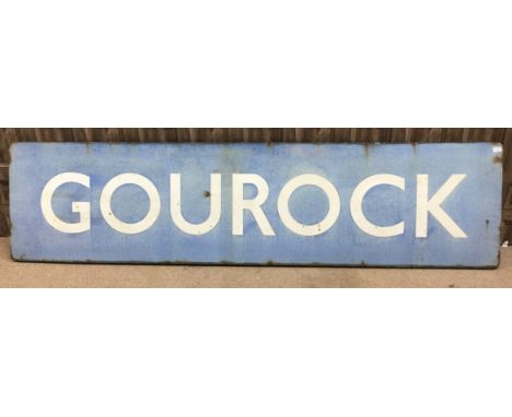 SCOTTISH RAILWAYS LARGE RUNNING IN ENAMEL SIGN - GOUROCK, single sided, white lettering on a blistered powder blue ground, 61