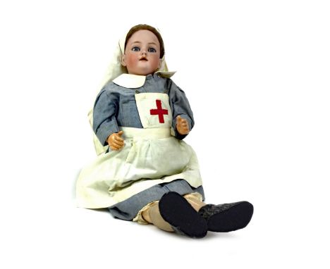 EARLY 20TH CENTURY BISQUE HEADED DOLL, by Simon &amp; Halbig, dressed as a nurse, with impressed marks to neck, 68cm high