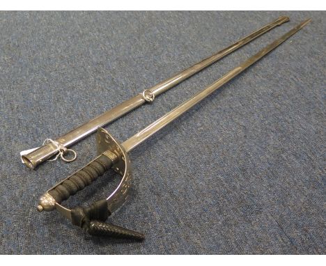 Sword: An 1897 Pattern Infantry Officers Sword with George V cypher & one pierced steel bowl. The blade 32½'' with one follow