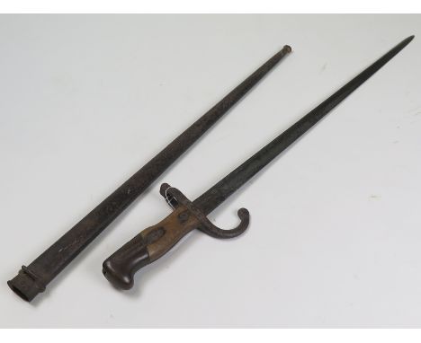 Bayonet: A French Model 1874 Gras Epee bayonet manufactured in June 1876. Worn and rusted overall in its steel scabbard (pitt