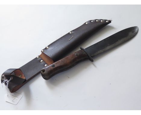 Knife: A British Mode 'D' survival general purpose knife. Heavy blade 7.25" stamped 'Rogers Sheffield England' & code '27C-23