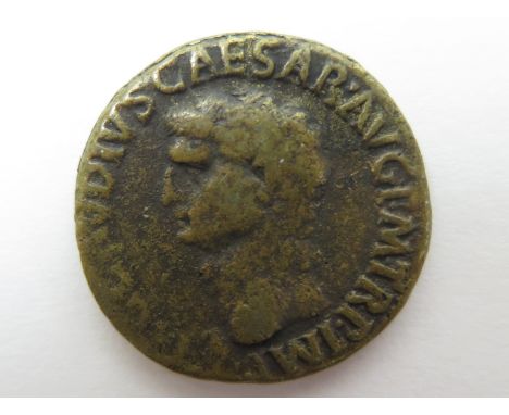 Claudius copper as Rome Mint 41-42 A.D., obverse legend K, reverse:- Constantia, helmeted, standing left, right hand raised, 
