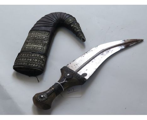 Arabian styled old Jambiya dagger, wooden handle, leather scabbard and silver decoration