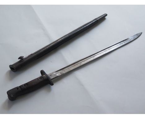Bayonet: A P'07 bayonet for the SMLE rifle made by Wilkinson in December 1916. In its steel mounted (round frog stud) leather