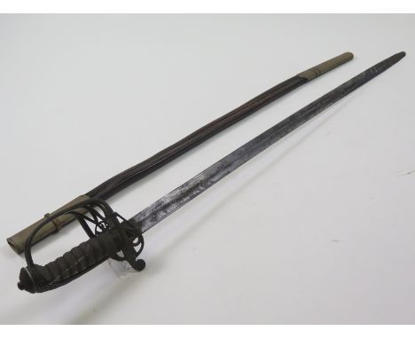 Sword: An 1845 Pattern Infantry Officers Sword. Brass guard with V.R. Cypher, folding guard. Engraved blade (blade tip heavil