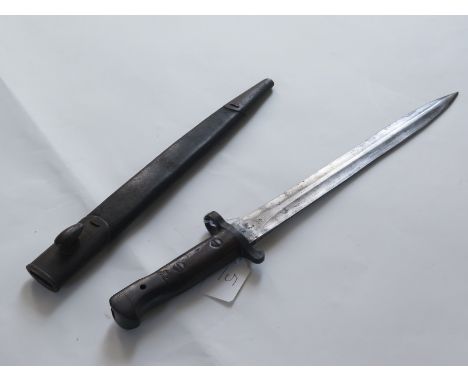Bayonet: A P.03 short bayonet for the SMLE rifle. Made at Enfield in Nov. 1905. WD marked. In its steel mounted leather scabb