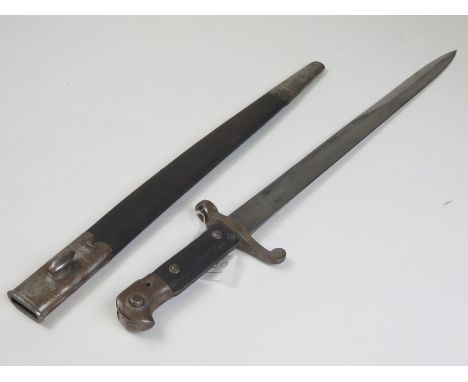 Bayonet: An 1887 MKIII sword bayonet for the Martini Henry rifle by Wilkinson, London and dated 1889. W/D marked. In its stee