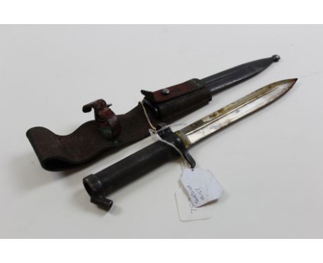 Bayonet: A good Swedish Model 1898 knife bayonet in its steel scabbard with original leather frog. Overall very good conditio