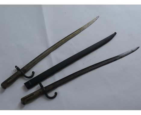 Bayonets: French Chasspot Model 1866 Sabre bayonets. 1) 1866 Pattern made at St Etienne in March 1874 (G.C.) in its steel sca