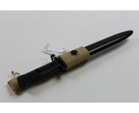 Bayonet: British LIA 4 (commercial) unmarked. Bowie blade 8". Metal grip. In its steel scabbard with webbing frog. For the S.