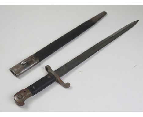 Bayonet: An 1887 MKII sword bayonet for the Martini Henry rifle. W/D marked and made by Wilkinson. Unfullered blade 18" in it