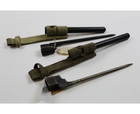 Bayonet: British No4 MK2 round blade, plastic scabbard with web frog. Good condition. With Bayonet: No 4 MK2 round blade in M